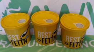 Three yellow buckets with black text that says "Rest >> Fettin" stand in a row.