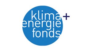 Blaues Logo mit weißem Schriftzug "klima+ energie fonds" in einem Kreis.