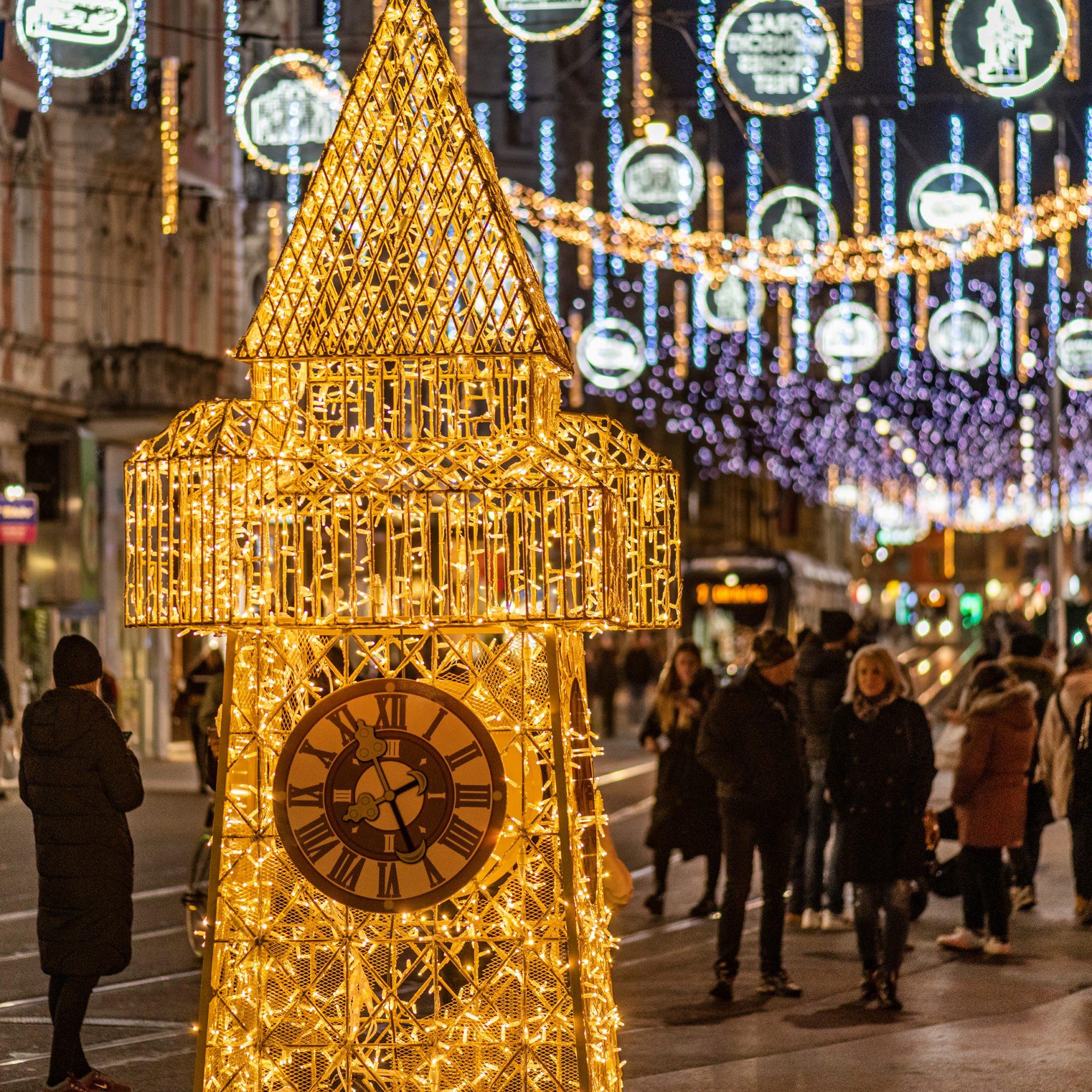 Graz street scene at night with Christmas decorations.